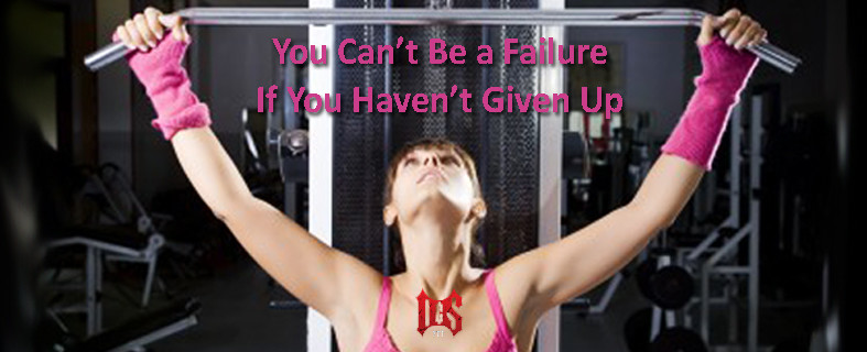You can't be a failure if you haven't given up - image of girl working out in the gym