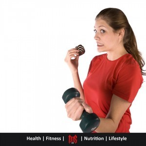 Girl having 'just one' piece of cake while working out to make it ok